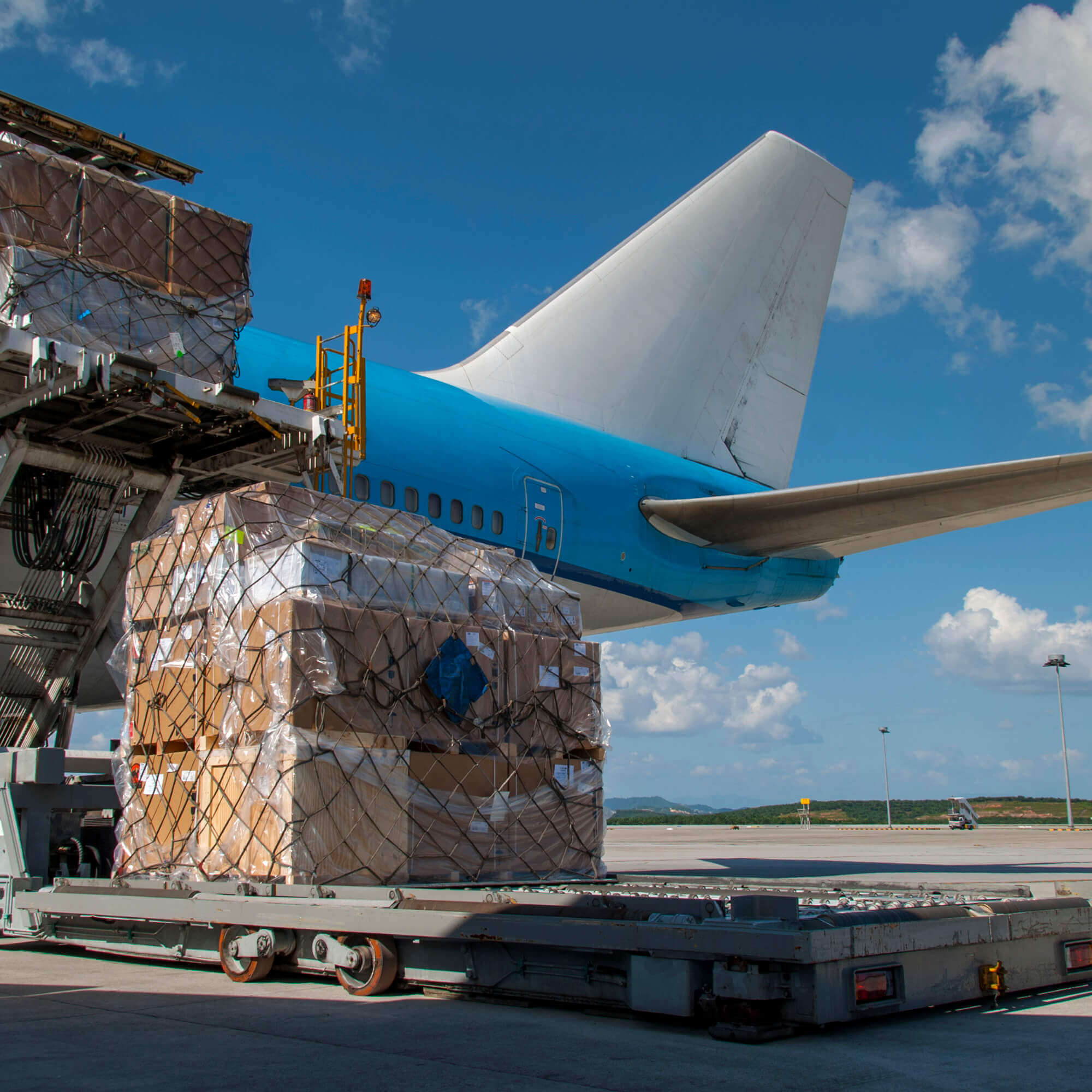 airplane loading up with boxes
