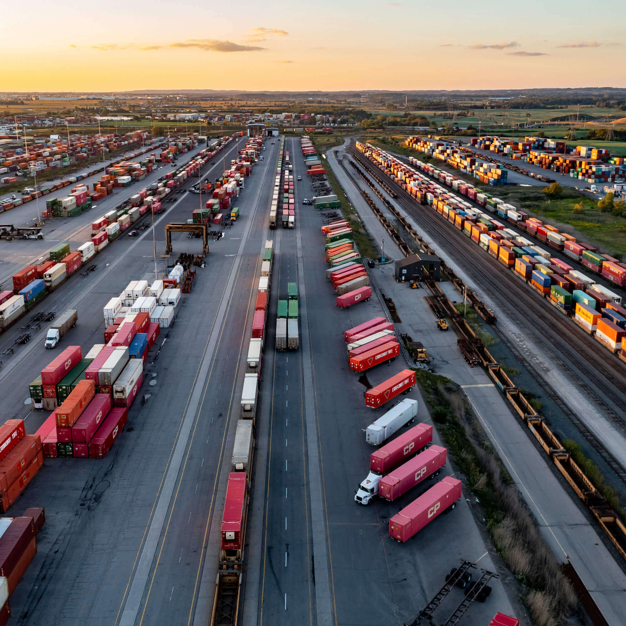 group of semi-trucks lined up