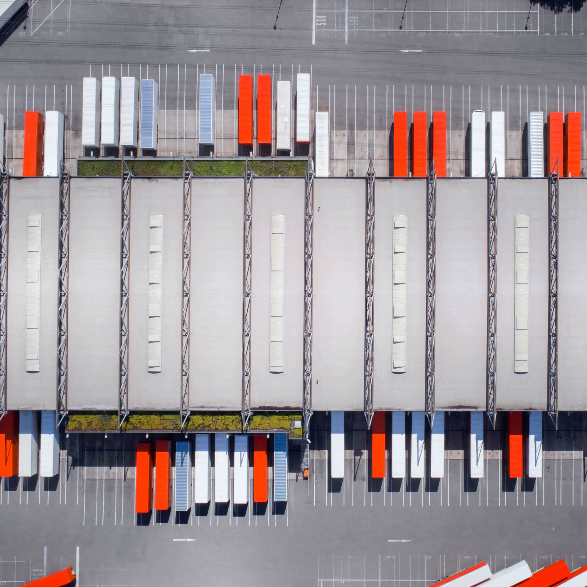 distribution center filled with semi-trucks